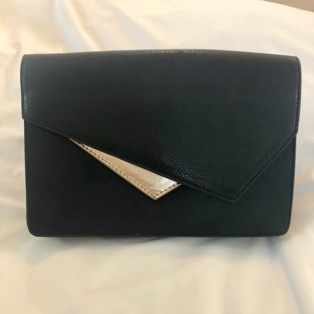 NWT Black and gold Bebe Clutch